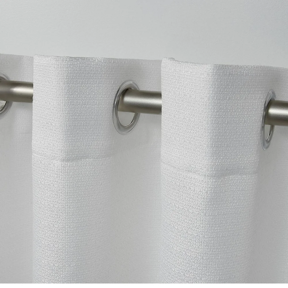 New Indoor/outdoor curtains. 2 panels 54x108 ea. Aztec white color